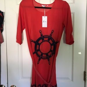 NWT red dress with boat wheel design.